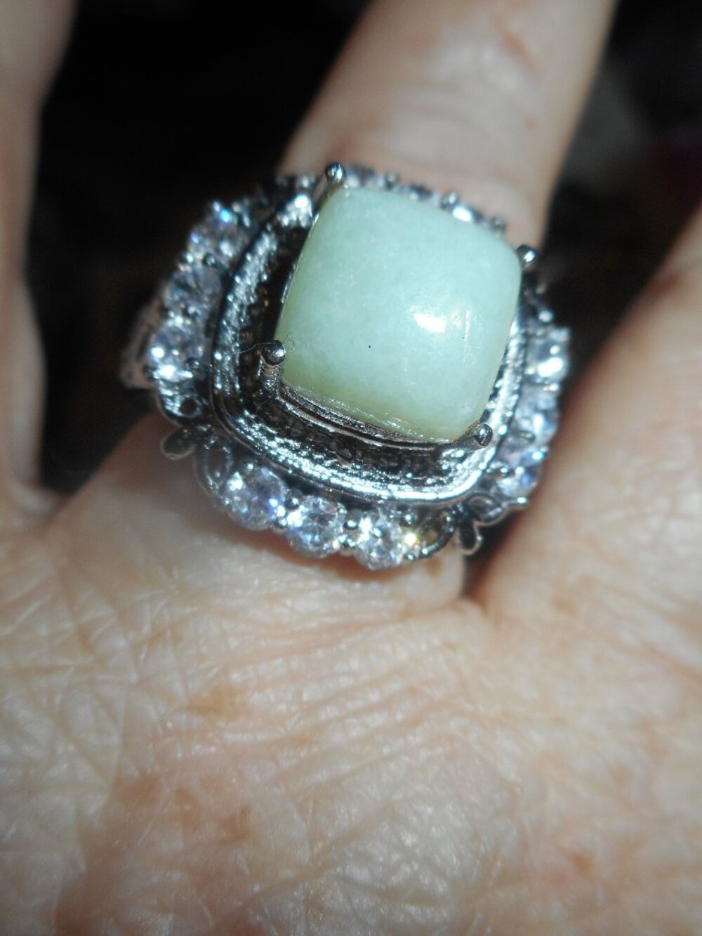 square stone on a silver band  ring - RING SIZE ABOUT 9